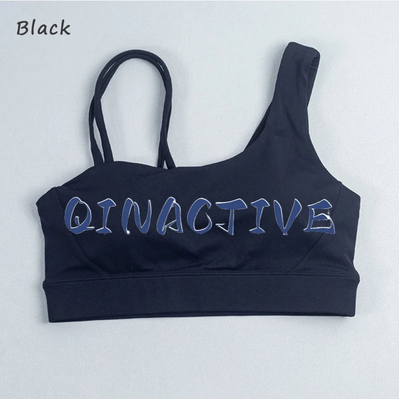 QINACTIVE Women's Sports Bra with Asymmetrical Shoulder Straps Yoga Top Removable Pads Beautiful Back Fitness Outfit Yoga Bra