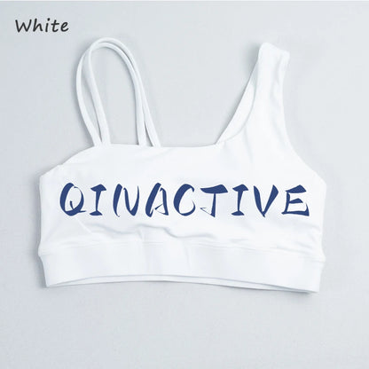 QINACTIVE Women's Sports Bra with Asymmetrical Shoulder Straps Yoga Top Removable Pads Beautiful Back Fitness Outfit Yoga Bra