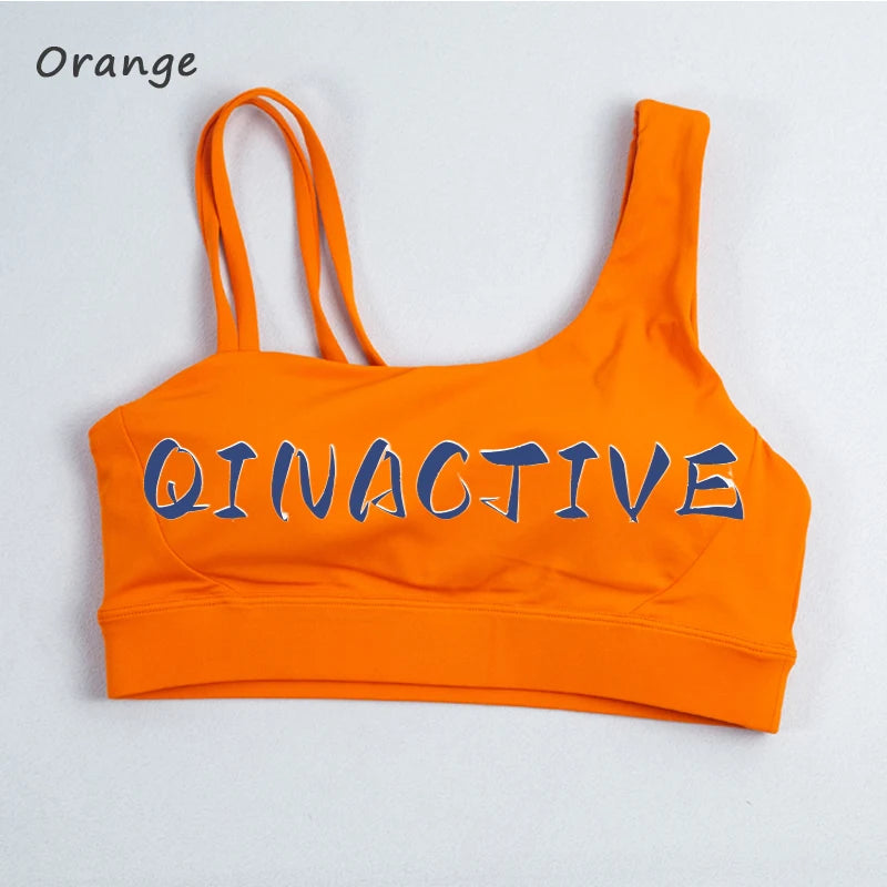 QINACTIVE Women's Sports Bra with Asymmetrical Shoulder Straps Yoga Top Removable Pads Beautiful Back Fitness Outfit Yoga Bra