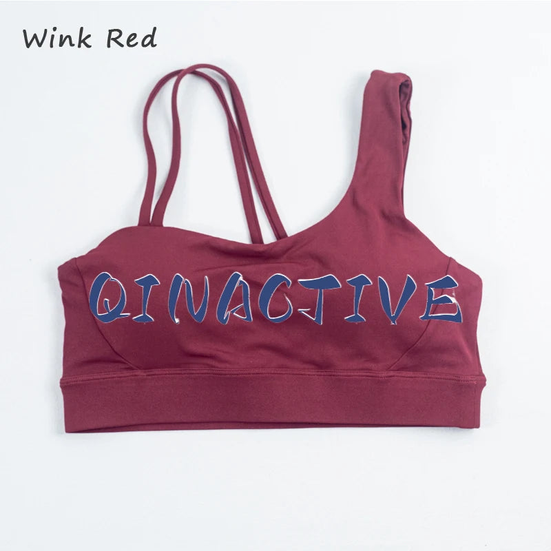 QINACTIVE Women's Sports Bra with Asymmetrical Shoulder Straps Yoga Top Removable Pads Beautiful Back Fitness Outfit Yoga Bra