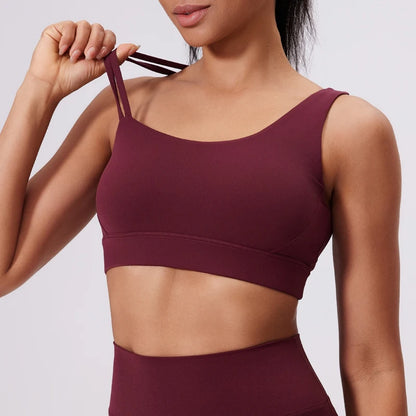 QINACTIVE Women's Sports Bra with Asymmetrical Shoulder Straps Yoga Top Removable Pads Beautiful Back Fitness Outfit Yoga Bra