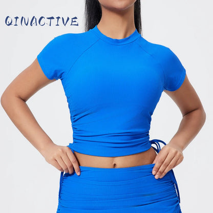 QINACTIVE Ribbed yoga short sleeved drawstring pleated yoga suit sports and fitness top women's tight yoga top